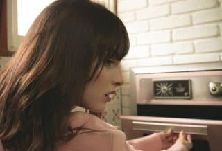 Woman Opening Oven