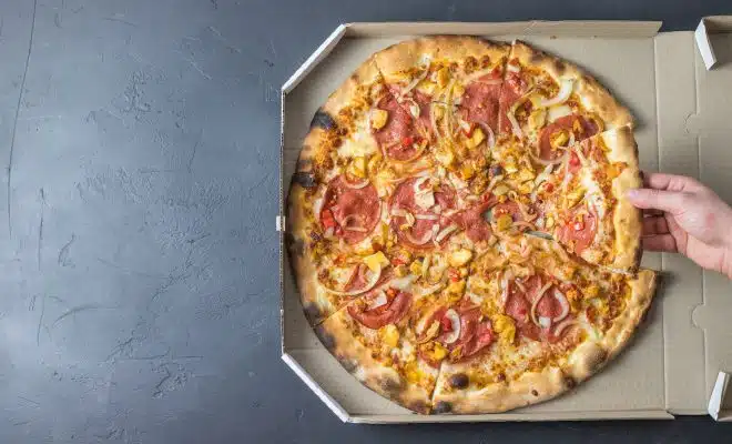 pizza on white cardboard box